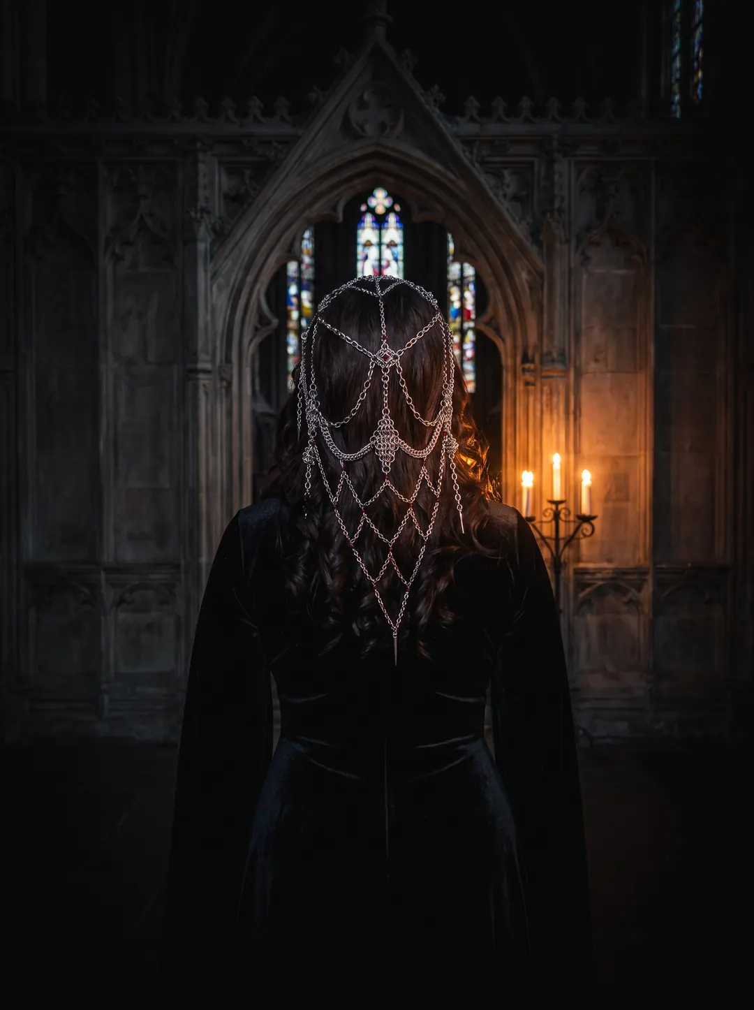 AI-generated photo of a model wearing the Crimson Cathedral Veil chainmail headdress, seen from behind