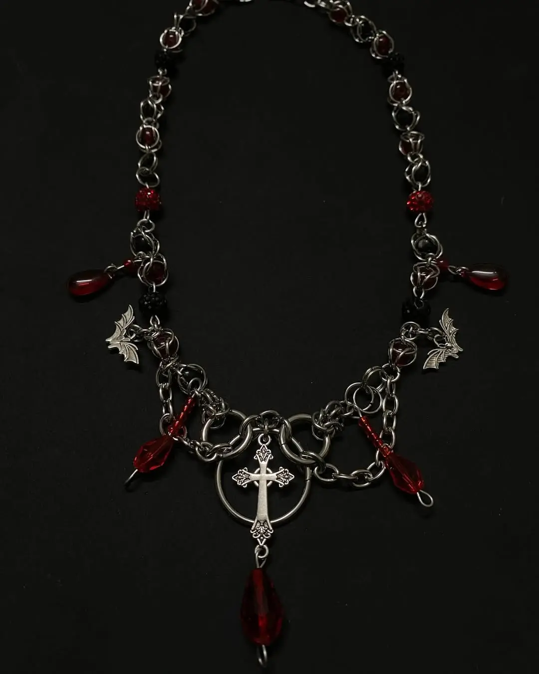 Dark Gothic Cross Necklace with Red Crystal Beads - Image 2
